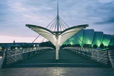 Low angle view of footbridge against sky