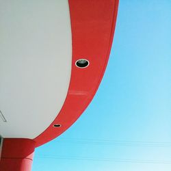 Low angle view of red wall