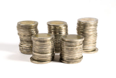 Close-up of stack of objects against white background