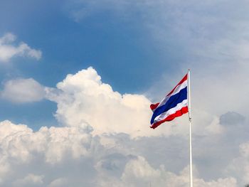 Low angle view of thailand flag against sky