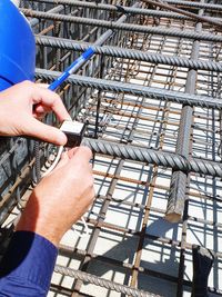 Midsection of man working at construction site