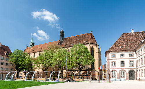 Exterior of historic building against blue sky