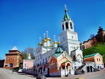 Low angle view of church against blue sky