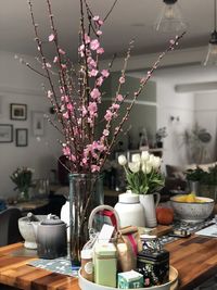 Close-up of flower vase on table at home