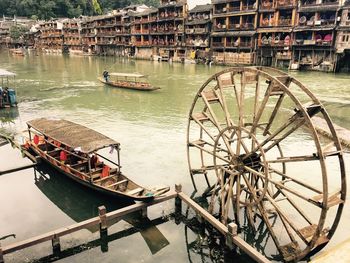 High angle view of boats moored at river