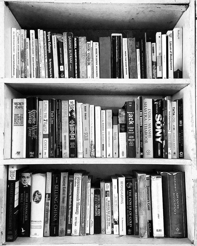 indoors, shelf, in a row, large group of objects, arrangement, variation, abundance, full frame, window, order, collection, book, store, choice, backgrounds, wood - material, side by side, retail, no people, day