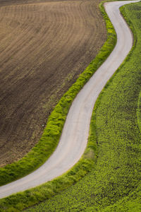 High angle view of road amidst land