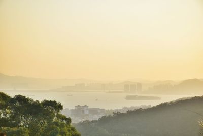 Scenic view of city against clear sky