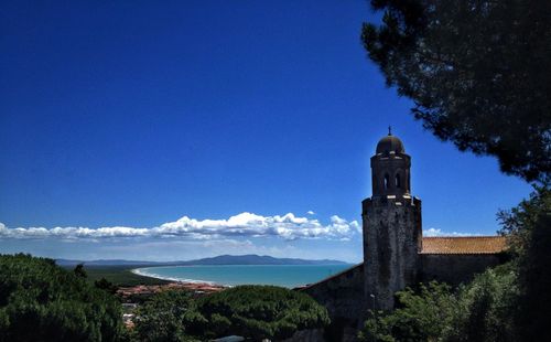 Scenic view of calm sea against blue sky