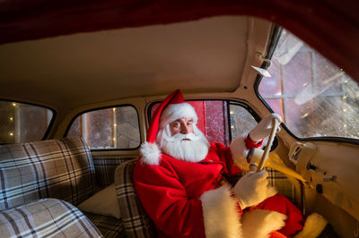 Portrait of woman in car