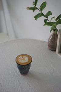 Close-up of coffee cup on table