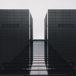 Directly below shot of modern building against sky