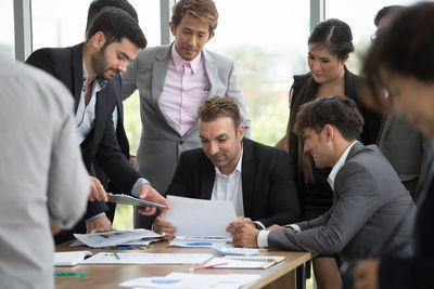 Group of people working on table