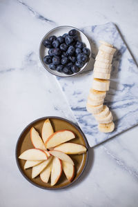 High angle view of fruits in bowl on table