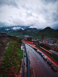 Train on road against sky