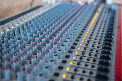 Close-up of sound mixer at recording studio