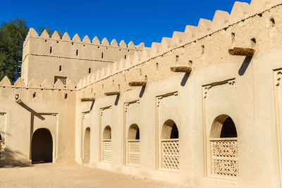 Low angle view of historical building against clear sky