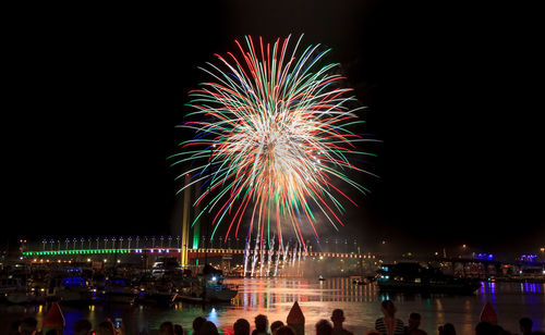 Sky illumed with fire crackers at night