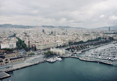 High angle view of river amidst buildings in city