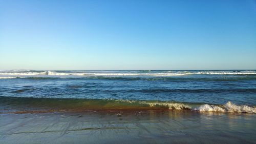 Scenic view of sea against clear sky