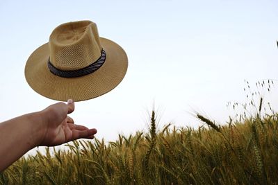 Cropped image of person standing on grass