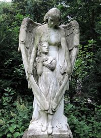 Statue of angel in park