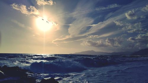 Scenic view of sea against sky during sunset