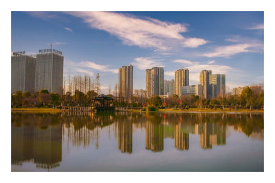 Reflection of buildings in lake