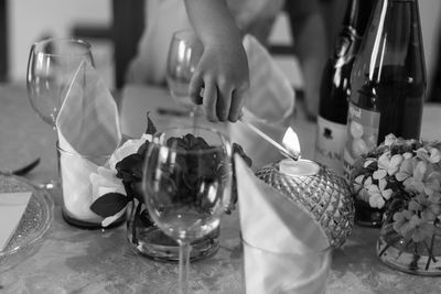 Close-up of wine glasses on table