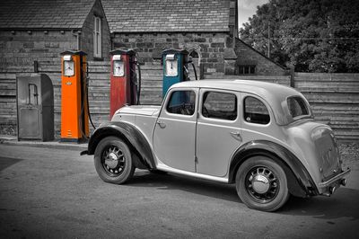 Vintage car parked on street in city