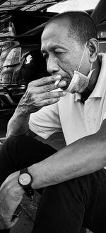 Portrait of man sitting in car