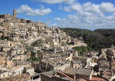 Aerial view of cityscape against sky