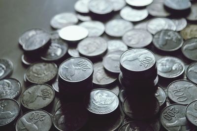 High angle view of coins on table