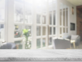 Close-up of glass window on table