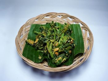 High angle view of vegetables in basket on table