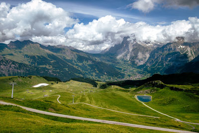 Aerial view of mountain range against sky