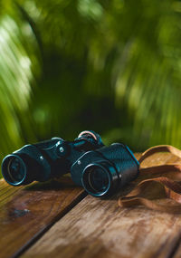 Close-up of binoculars on table