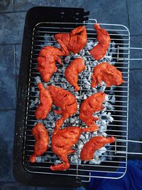 Close-up of meat on barbecue grill