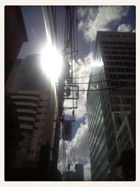 Low angle view of modern building against sky