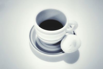 Close-up of coffee over white background