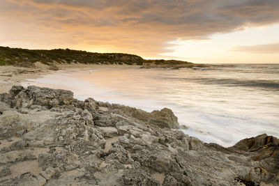 Scenic view of sea against sky during sunset