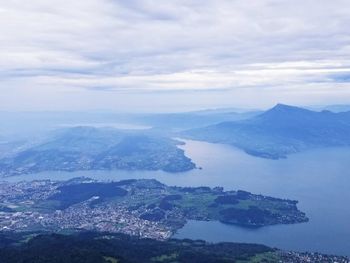 Aerial view of landscape and mountains against sky