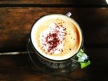 High angle view of cappuccino on table