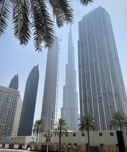 Low angle view of modern buildings against sky