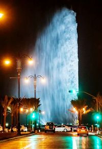 Illuminated street light at night