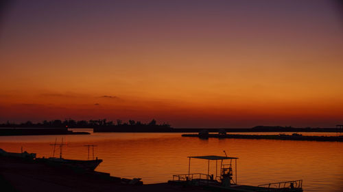 Fishing port and boat in red at sunset miyako island, a remote island in okinawa prefecture