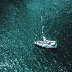 Aerial view of sailboat sailing on sea