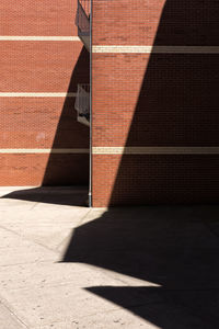 Sunlight falling on brick wall