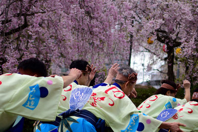 Group of people on cherry blossom