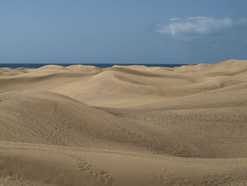 Scenic view of desert against sky